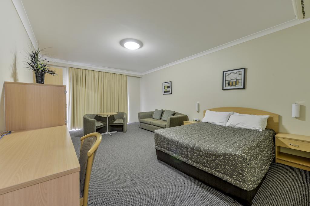 تامفورث Golden Guitar Motor Inn الغرفة الصورة
