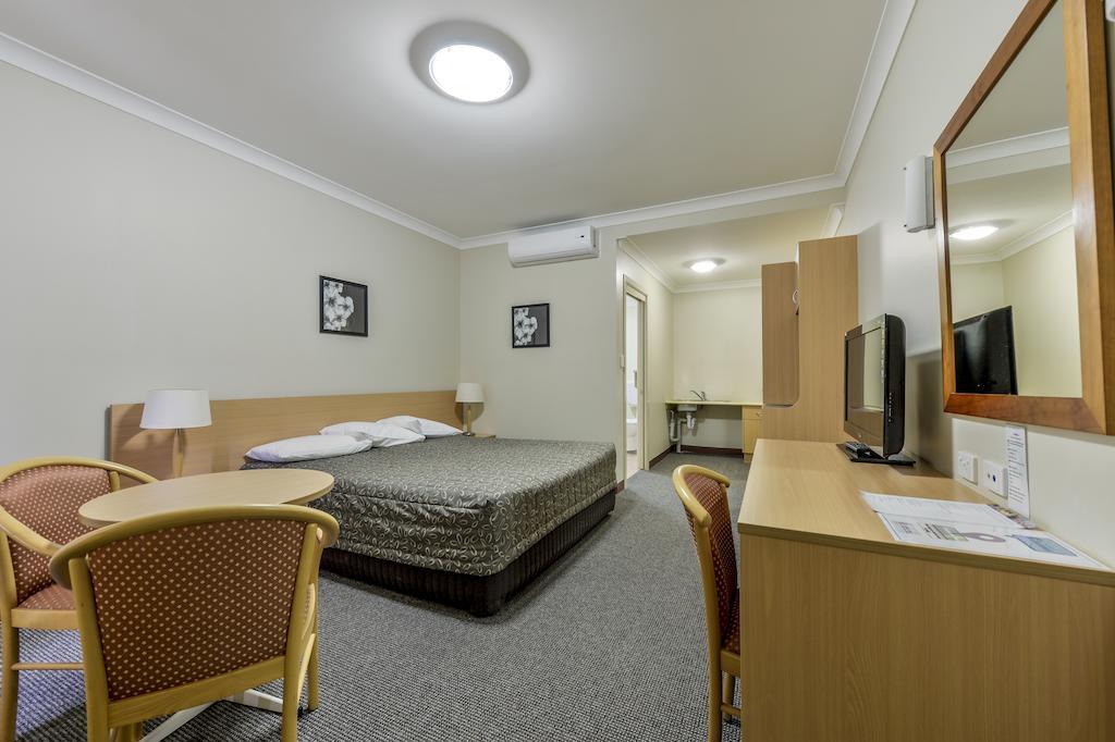 تامفورث Golden Guitar Motor Inn الغرفة الصورة