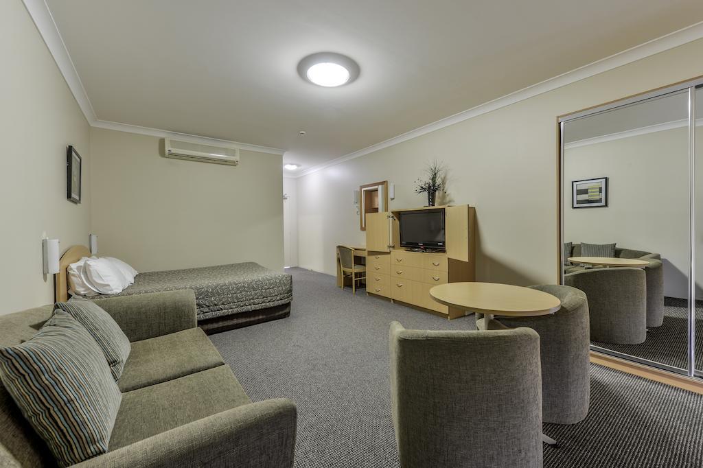 تامفورث Golden Guitar Motor Inn الغرفة الصورة